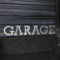 garage,home,gift,present,tool,detail,finishing,exterior,car cover,wrench,protection,sign,signage,battery,accessory,pillow,couch,car,truck,custom,build,workspace,wall,thermometer,retro,vintage,classic,door,mirror,display,mount